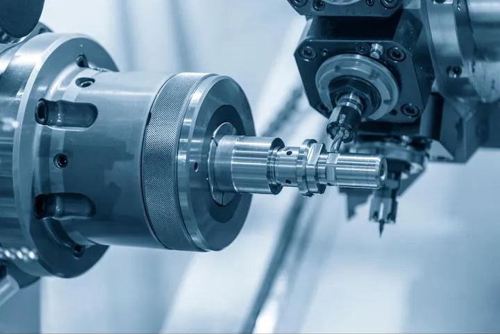 CNC-turn-mill-machine-cutting-groove-at-the-metal-shaft